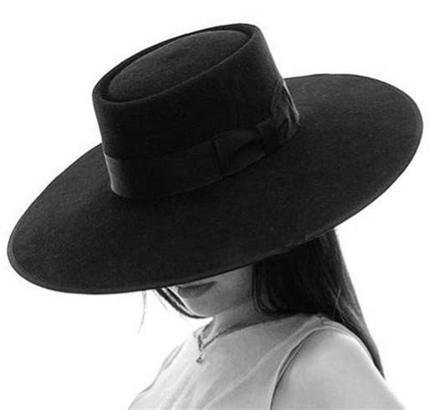 The Fashion Iconography of the Large Brim Witch Hat in Different Cultures